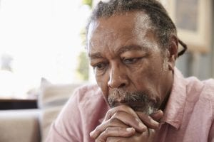 senior man sitting on a sofa